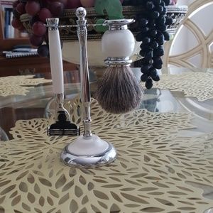 Man's razor and shaving cream brush